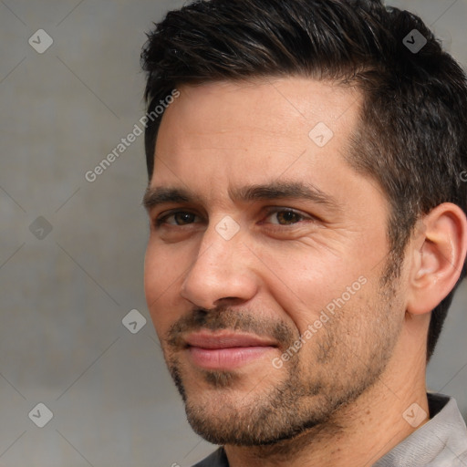 Joyful white adult male with short  brown hair and brown eyes