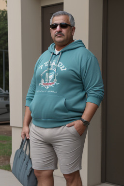 Syrian middle-aged male with  gray hair