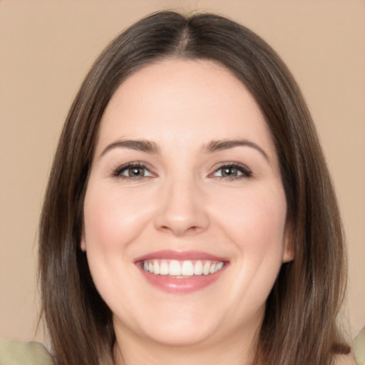 Joyful white young-adult female with medium  brown hair and brown eyes