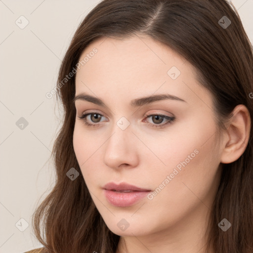 Neutral white young-adult female with long  brown hair and brown eyes