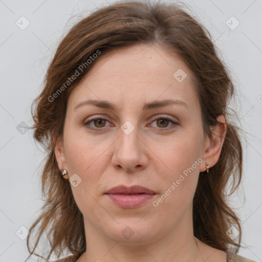 Joyful white young-adult female with medium  brown hair and green eyes