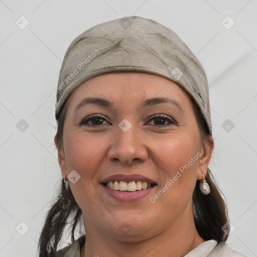 Joyful white adult female with medium  brown hair and brown eyes