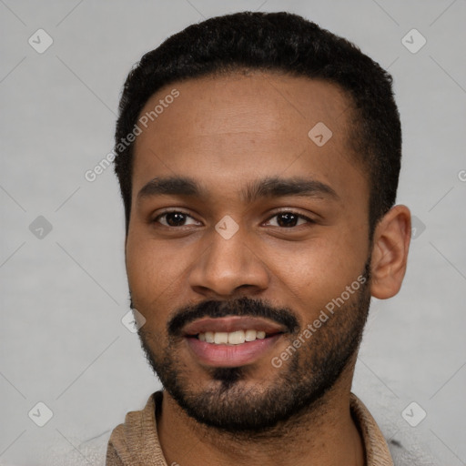 Joyful black young-adult male with short  black hair and brown eyes