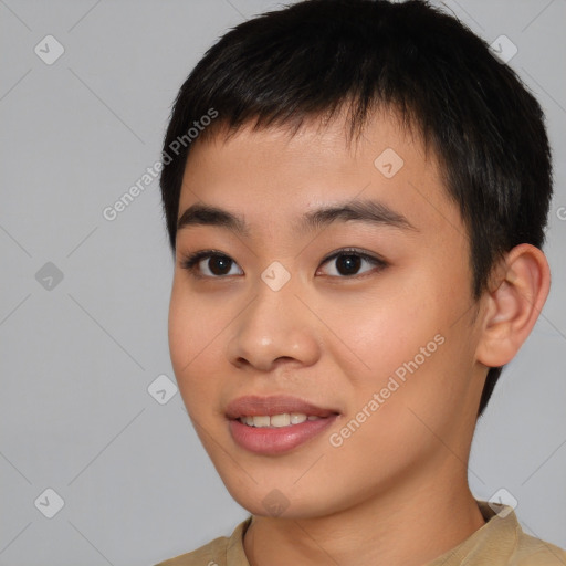 Joyful asian young-adult male with short  black hair and brown eyes