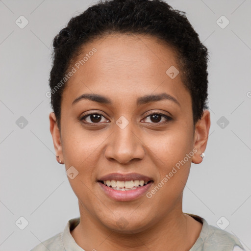 Joyful latino young-adult female with short  brown hair and brown eyes