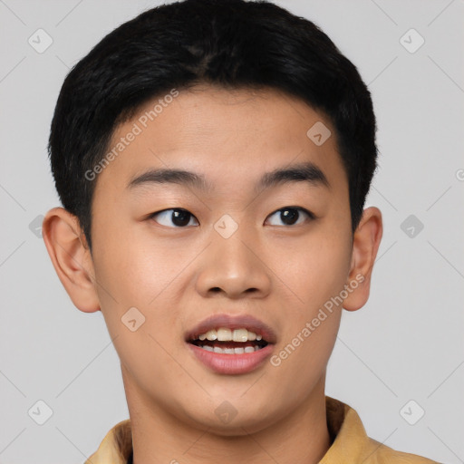 Joyful asian young-adult male with short  black hair and brown eyes