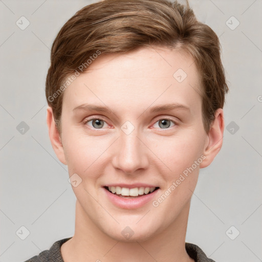 Joyful white young-adult female with short  brown hair and grey eyes