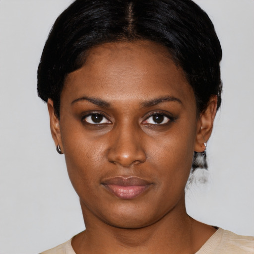 Neutral black young-adult female with short  black hair and brown eyes