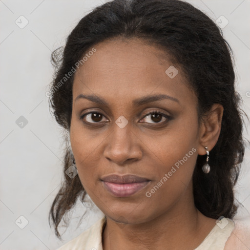 Joyful black young-adult female with medium  brown hair and brown eyes