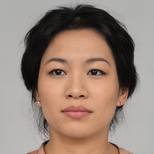 Neutral asian young-adult female with medium  brown hair and brown eyes