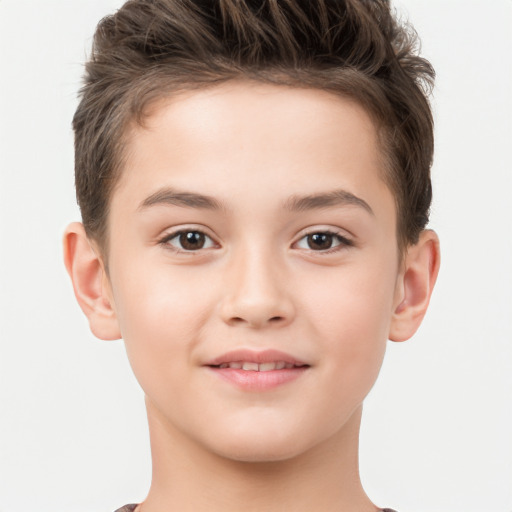 Joyful white child male with short  brown hair and brown eyes