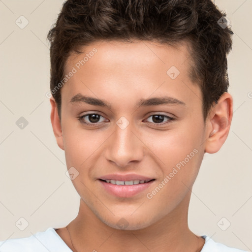 Joyful white child male with short  brown hair and brown eyes