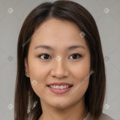 Joyful white young-adult female with long  brown hair and brown eyes