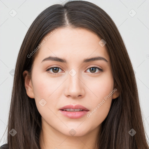 Neutral white young-adult female with long  brown hair and brown eyes