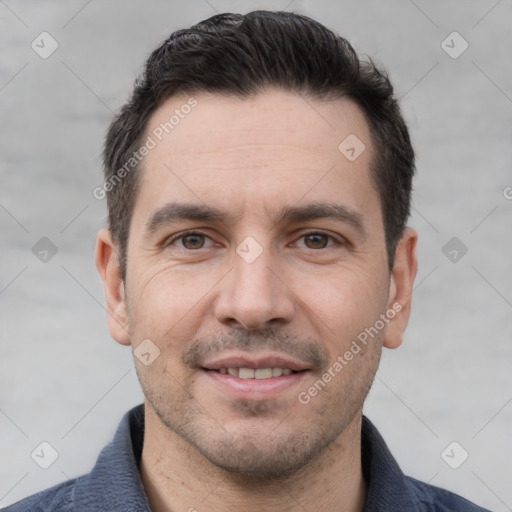 Joyful white young-adult male with short  black hair and brown eyes