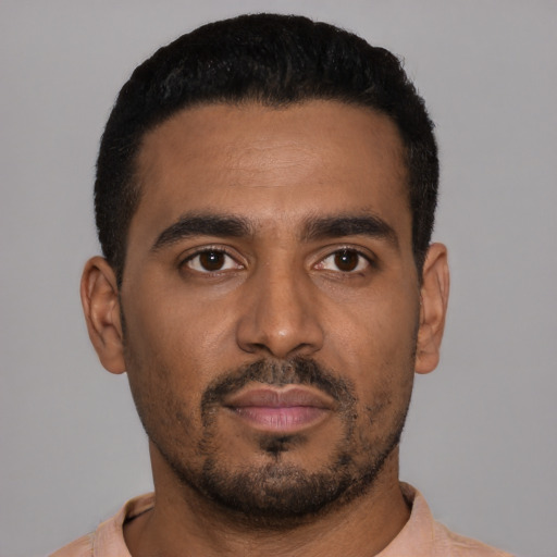 Neutral black young-adult male with short  black hair and brown eyes