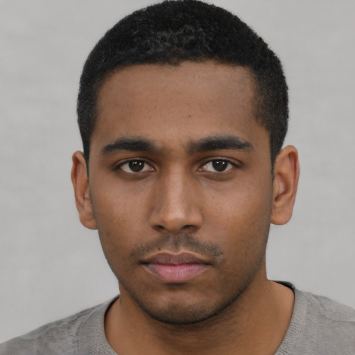 Neutral black young-adult male with short  black hair and brown eyes