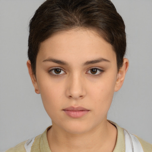 Neutral white young-adult female with short  brown hair and brown eyes