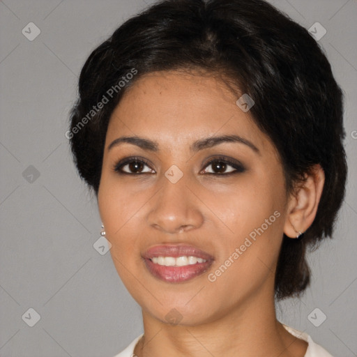 Joyful latino young-adult female with medium  black hair and brown eyes