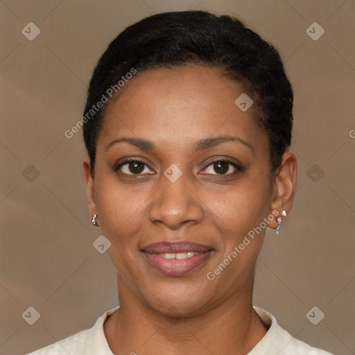 Joyful black young-adult female with short  black hair and brown eyes