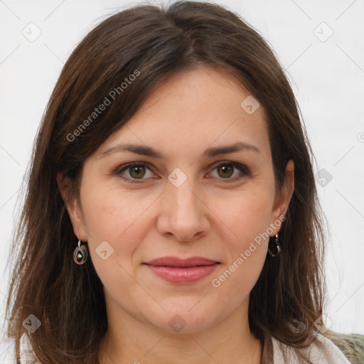 Joyful white adult female with long  brown hair and brown eyes