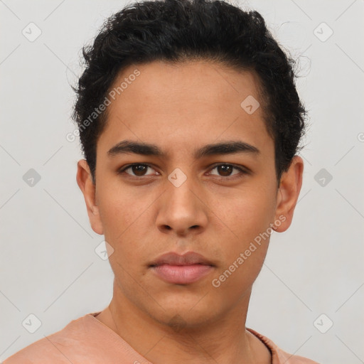 Neutral latino young-adult male with short  brown hair and brown eyes