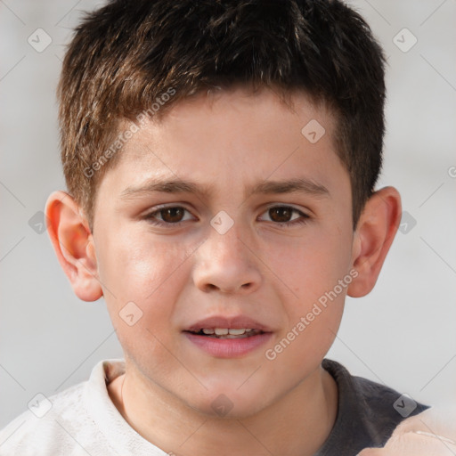 Joyful white child male with short  brown hair and brown eyes