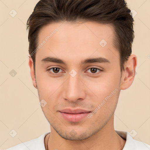 Joyful white young-adult male with short  brown hair and brown eyes