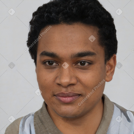 Joyful black young-adult male with short  black hair and brown eyes