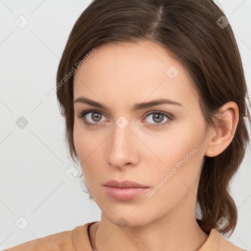 Neutral white young-adult female with medium  brown hair and brown eyes