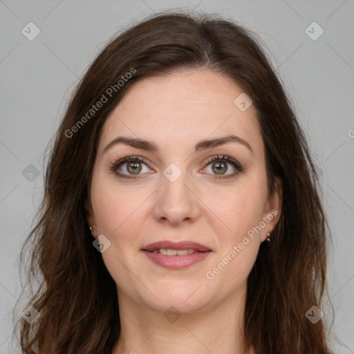 Joyful white young-adult female with medium  brown hair and green eyes