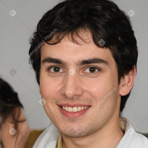 Joyful white young-adult male with medium  brown hair and brown eyes