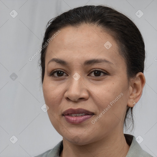 Joyful white adult female with medium  brown hair and brown eyes