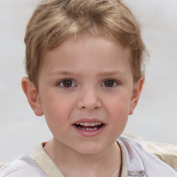 Joyful white child male with short  brown hair and brown eyes