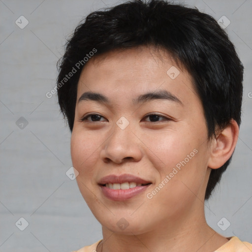 Joyful asian young-adult female with short  brown hair and brown eyes