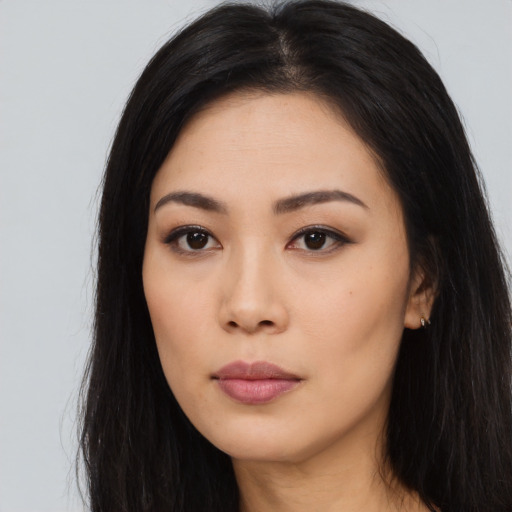 Neutral asian young-adult female with long  black hair and brown eyes