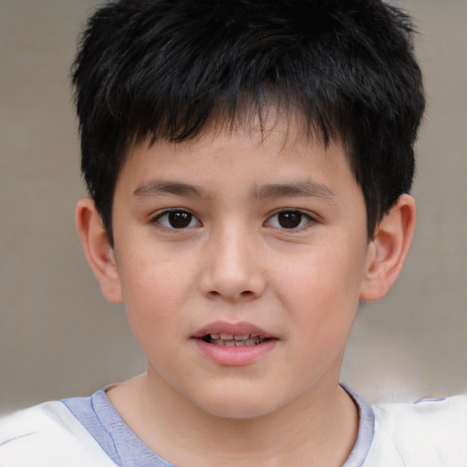 Joyful white child male with short  brown hair and brown eyes