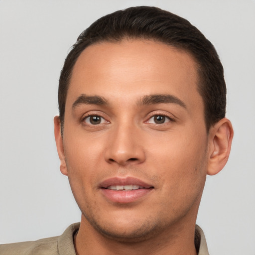 Joyful white young-adult male with short  brown hair and brown eyes