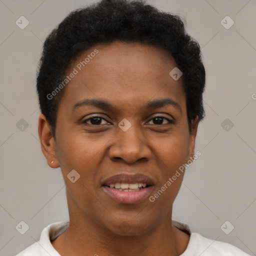 Joyful black young-adult female with short  black hair and brown eyes