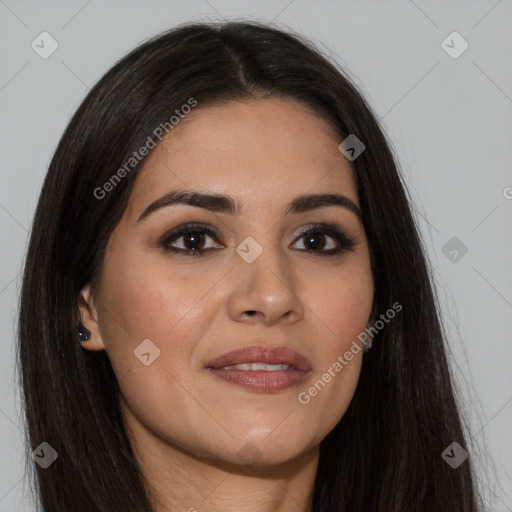 Joyful latino young-adult female with long  brown hair and brown eyes