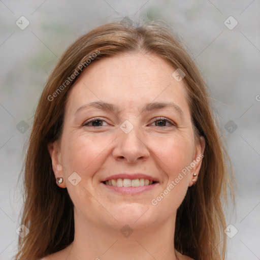 Joyful white adult female with medium  brown hair and brown eyes