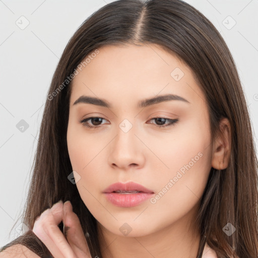 Neutral white young-adult female with long  brown hair and brown eyes