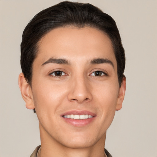 Joyful white young-adult male with short  brown hair and brown eyes