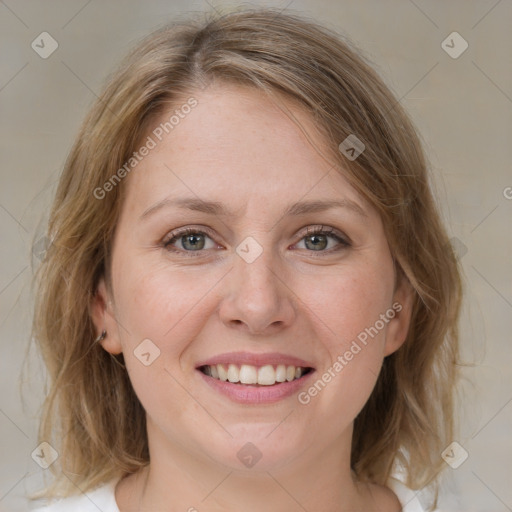 Joyful white young-adult female with medium  brown hair and blue eyes