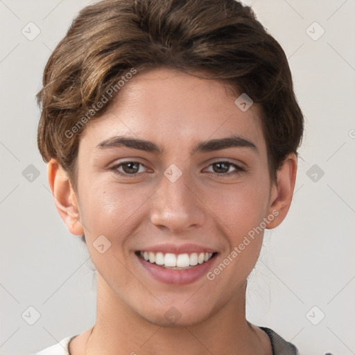 Joyful white young-adult female with short  brown hair and brown eyes