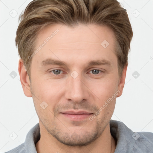 Joyful white adult male with short  brown hair and grey eyes