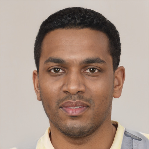 Neutral black young-adult male with short  black hair and brown eyes