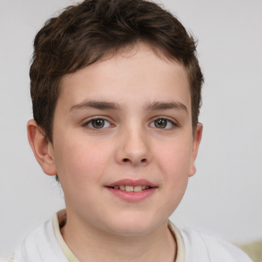 Joyful white child female with short  brown hair and brown eyes