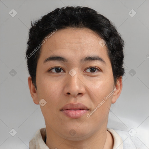 Joyful asian young-adult male with short  brown hair and brown eyes