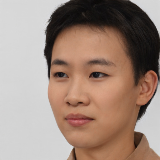 Neutral asian young-adult male with short  black hair and brown eyes